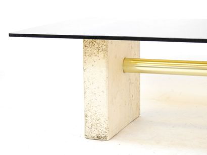 null LOW TABLE with rectangular top in smoked glass resting on two travertine feet...