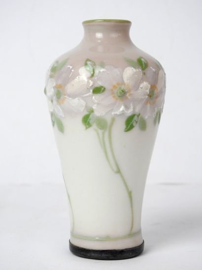 null VASE with high body in porcelain with decoration in relief of a frieze of flowers,...