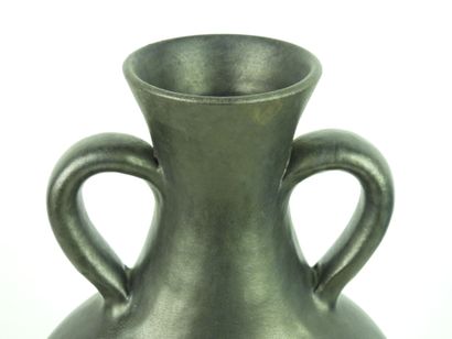 null Robert PICAULT (1919-2000): Black glazed ceramic ring vase with two handles....