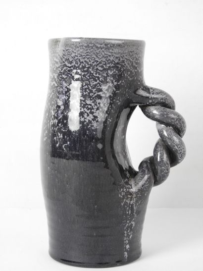 null ACCOLAY : Ceramic pitcher with purple glaze and twisted handle. Signed and annotated...