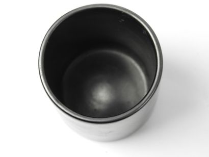 null 
Georges JOUVE (1910 - 1964): Vase cylindrique en céramique émaillée noir. Signature...