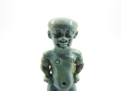 null Grande amulette en faïence émaillée bleue représentant Ptah Patèque

Hauteur :...