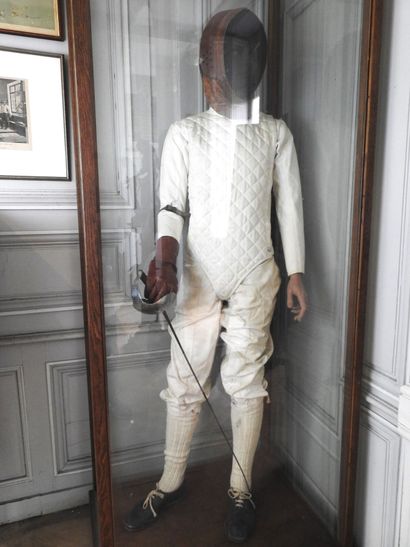 null FENCING. Mannequin of a saber fencer circa 1930-1940, consisting of the grill...