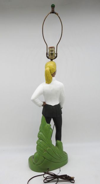 null SCULPTURE. Polychrome plaster mounted in lamp representing a fencer, H: 60 cm....