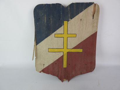 null LIBERATION. Wooden shield painted tricolor with a cross of Lorraine in the center,...