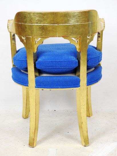 null OFFICE CHAIR in molded, carved and gilded wood, the armrests with goat heads,...