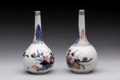 null CHINA : Pair of porcelain soliflores vases with floral decoration called Imari....