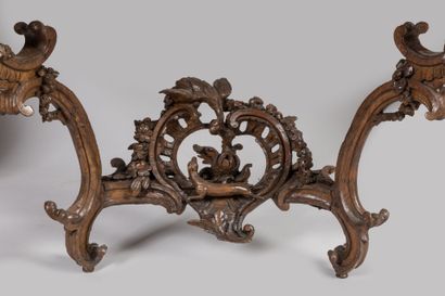 null CONSOLE in molded and carved oak; the belt is centered with a rocaille cartouche...