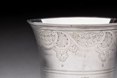null TIMBALE on silver pedestal with chased flowers on a bitter background and the...