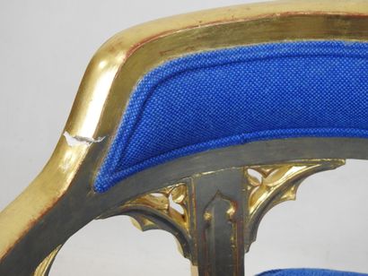 null OFFICE CHAIR in molded, carved and gilded wood, the armrests with goat heads,...