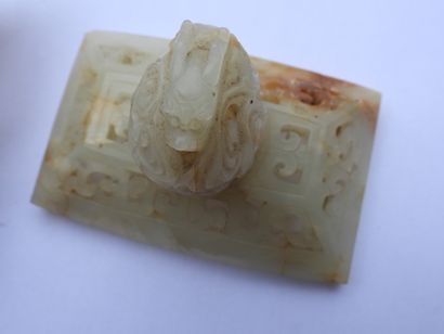 null CHINA - Early 20th century: Nephrite celadon carved and rust veined incense...
