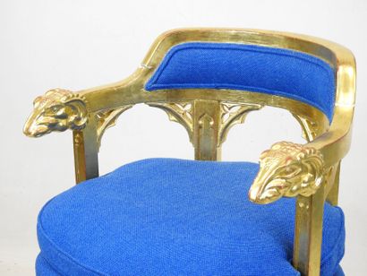 null OFFICE CHAIR in molded, carved and gilded wood, the armrests with goat heads,...
