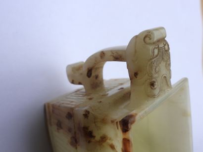 null CHINA - Early 20th century: Nephrite celadon carved and rust veined incense...