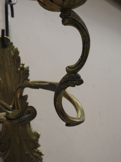 null Pair of chased and gilded bronze sconces with three arms of lights in the form...