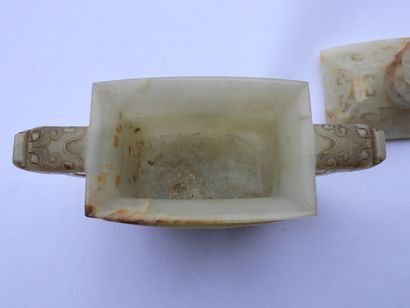 null CHINA - Early 20th century: Nephrite celadon carved and rust veined incense...