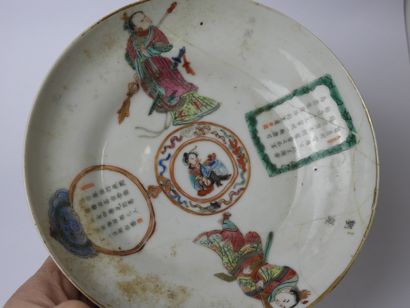 null CHINA: Two polychrome porcelain cups and saucers decorated with warriors and...