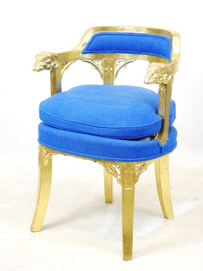 null OFFICE CHAIR in molded, carved and gilded wood, the armrests with goat heads,...