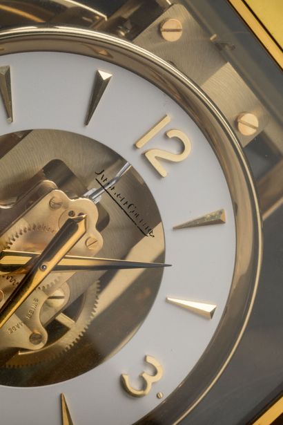 null JAEGER LECOULTRE. Atmos clock, gilt brass cage and base, perpetual movement....