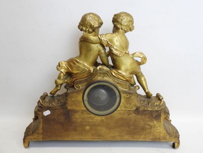 null Gilded bronze and alabaster fireplace set decorated with two birds and butterflies....