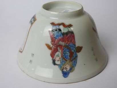 null CHINA: Two polychrome porcelain cups and saucers decorated with warriors and...