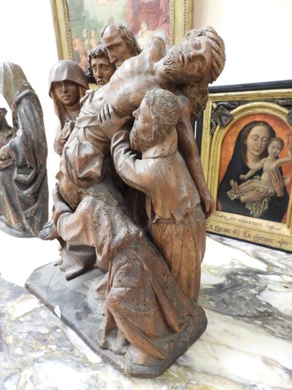null Group from a carved walnut altarpiece representing the Descent from the Cross
Brabant,...
