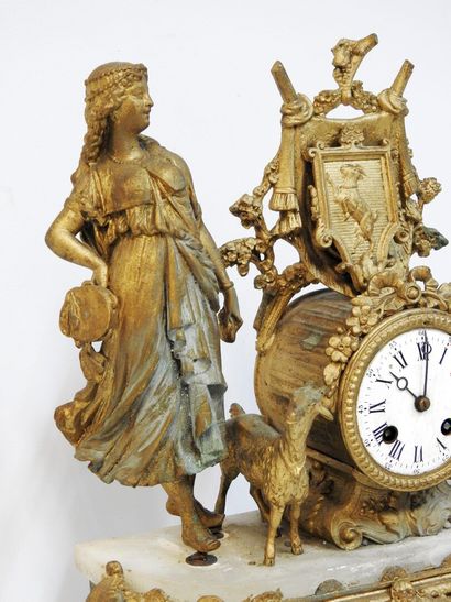 null Clock in gilded regula representing a woman playing the tambourine accompanied...