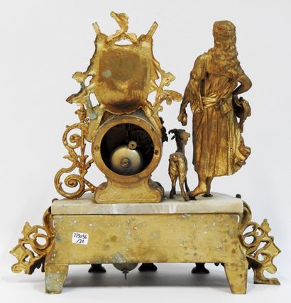 null Clock in gilded regula representing a woman playing the tambourine accompanied...