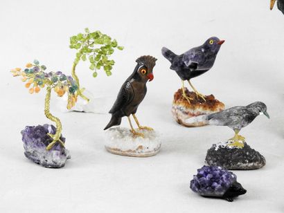 null Collection of miniature birds in minerals including eye of the tiger, amethyst,...