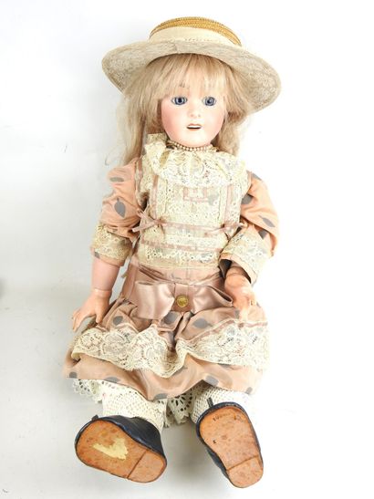 null E. TASSON: French doll, porcelain head, fixed blue eyes, open mouth. Marked...