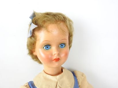 null BELLA plastic doll. Blue sleeping eyes and noisemaker. Signed under the shoes....