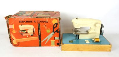 null Plastic and metal sewing machine 116 B MC. Battery operated. In its original...