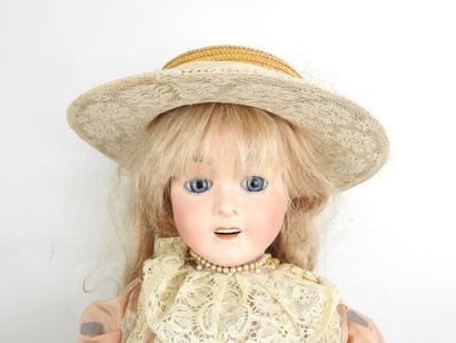 null E. TASSON: French doll, porcelain head, fixed blue eyes, open mouth. Marked...
