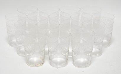 null Suite of 16 crystal glasses with engraved decoration with the point of sinusoidal...