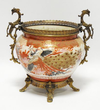 null SATSUMA 
Porcelain egg-shaped pot cover with peacock decoration on a pale pink...