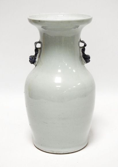 null CHINA - 20th century
Celadon colored porcelain vase decorated with a dance course...