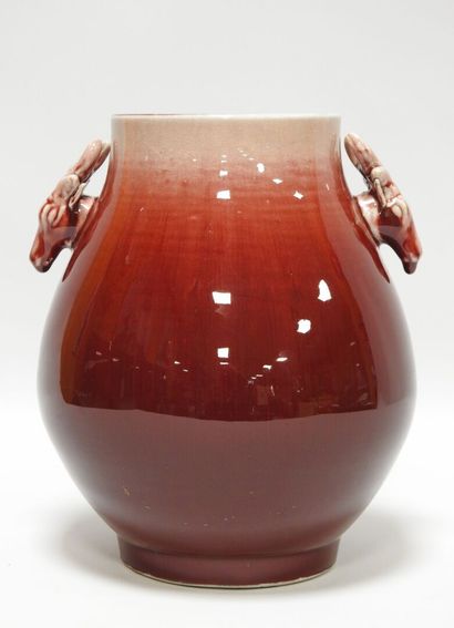 null Modern school
Porcelain stoneware vase with oxblood glaze and handles with deer...