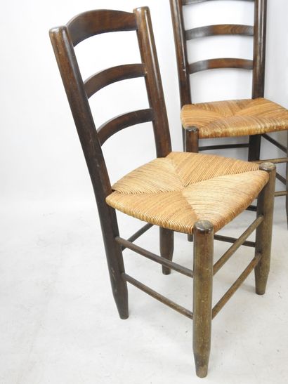 null Charlotte PERRIAND (1903-1999), in the style of : Four wooden chairs with straw...