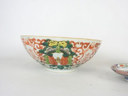 null CHINA: Porcelain bowl with enameled decoration of flowers and inscriptions....