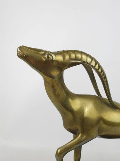 null Zoltan KOVATS (1883 1952): Antelope in gilded patinated bronze, on a black marble...