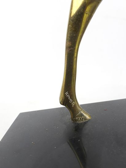 null Zoltan KOVATS (1883 1952): Antelope in gilded patinated bronze, on a black marble...