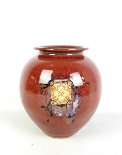 null Didier Marty (b. 1953): Large red enameled stoneware ball vase decorated with...