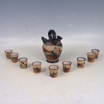 null CIBOURE: Chevrette et neuf gobelets en céramique à décor tournant de berger...