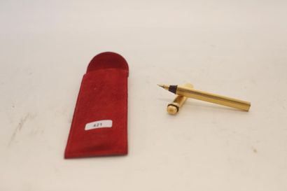 CARTIER - PARIS Stylo plaqué or, marqué, avec pochette d'origine et accessoires,...