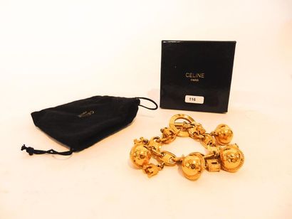 CELINE - PARIS Bracelet à breloques en métal doré, marqué, avec housse et boîte,...
