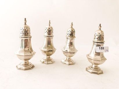 null Suite of four elegant salt shakers in baluster with sides on pedestal, early...