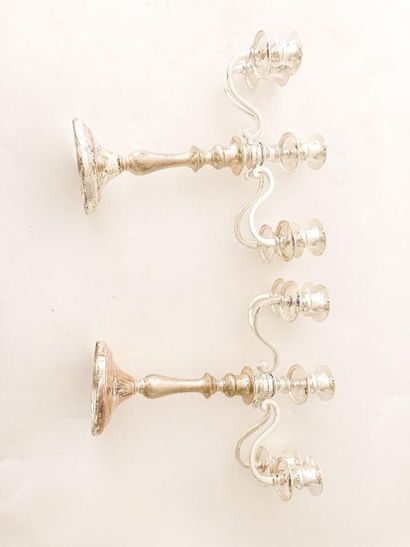 null Two pairs of candelabra (three and five-light), late 20th century, silver metal,...