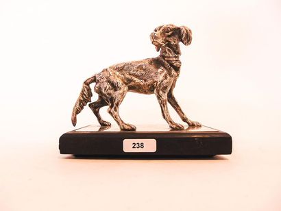 null "Dog on the lookout", 20th century, chased silver subject, stone base, punch...
