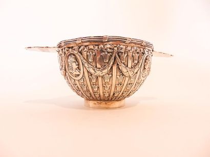 null Lugged bowl decorated with medallions and festoons, 19th century, richly chiselled...