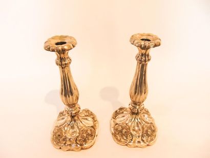 VIENNE Pair of ribbed torches, 1861, chased and weighted silver, hallmarks, h. 29.5...
