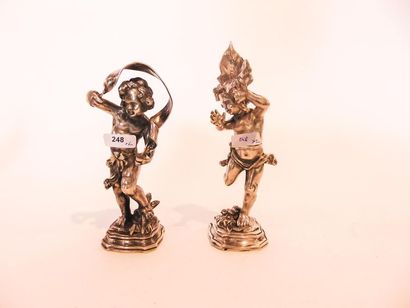 null "Putti", early 20th century, pair of chased silver subjects, punches, h. 14.5...